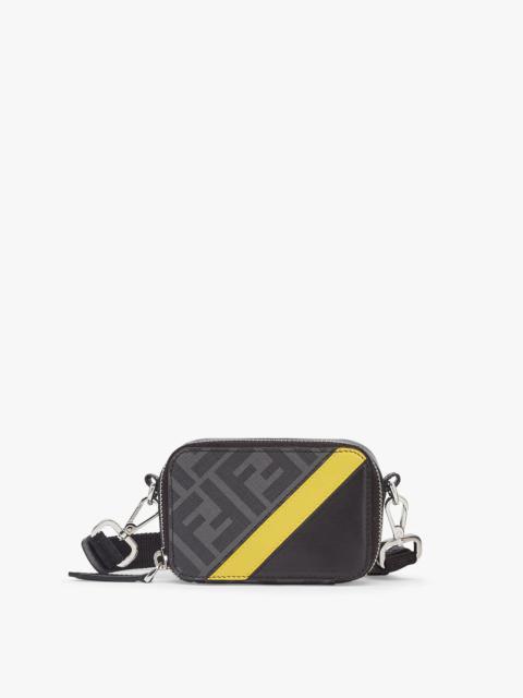 FENDI Compact mini pouch with zip fastening. The cross-body strap is adjustable and detachable. Made of te