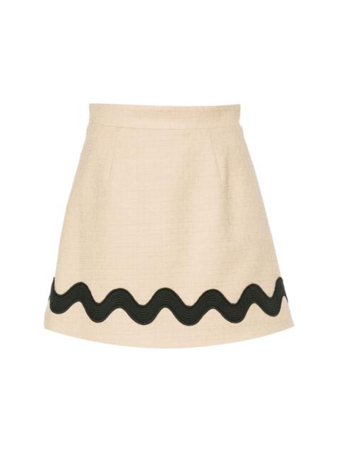 PATOU Iconic tweed mini skirt