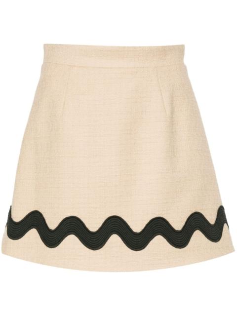 PATOU Iconic tweed mini skirt