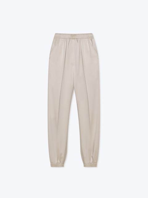 Nanushka JOLIEN - Slip-satin tapered pants - Creme