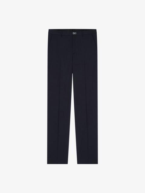 Givenchy SLIM FIT TAILORED PANTS IN WOOL WITH 2G CLIP