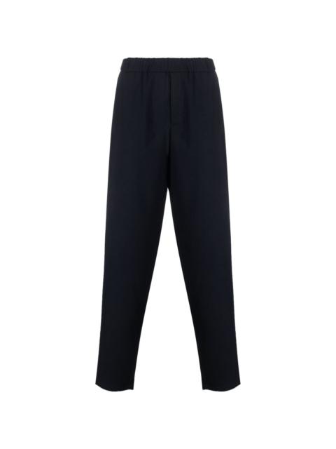 fine-ribbed tapered wool-blend trousers