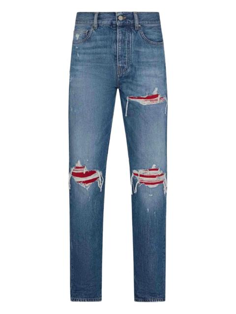 AMIRI Amiri Distressed Ripped-knees Denim Jeans