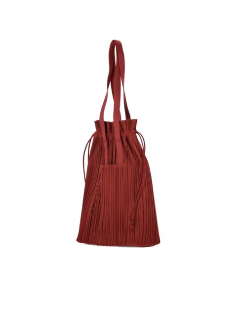 Pleats Please Issey Miyake pleated drawstring tote bag