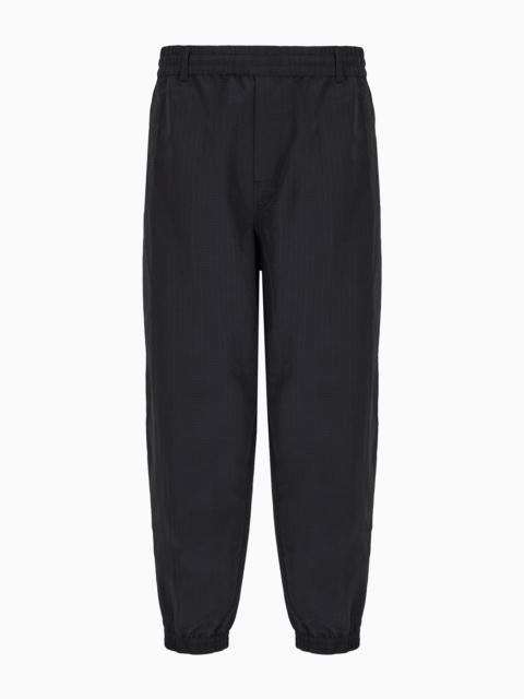 Light nylon seersucker trousers with stretch hem and zip