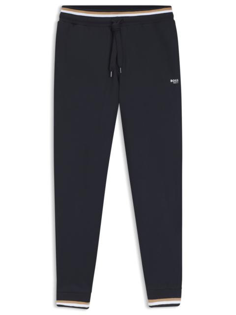 BOSS COTTON-TERRY TRACKSUIT BOTTOMS WITH SIGNATURE STRIPES AND LOGO