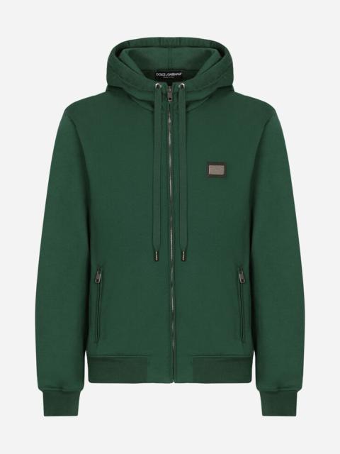 Jersey zip-up hoodie with branded tag