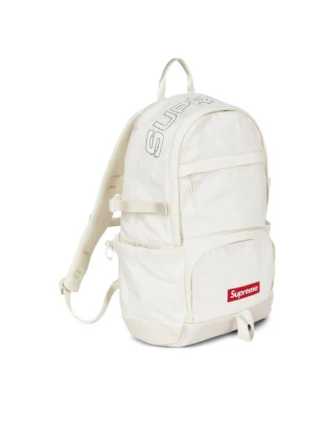 Supreme logo-plaque denim backpack