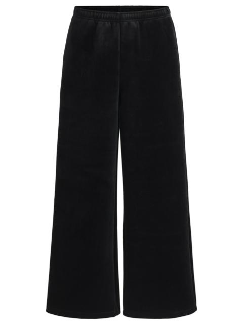 HUGO RELAXED-FIT TRACKSUIT BOTTOMS IN STRETCH VELOUR