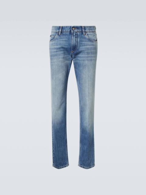 Mid-rise distressed skinny jeans