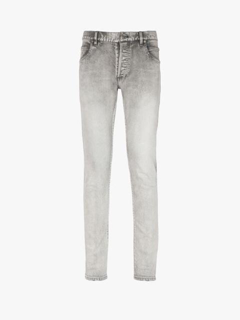 Balmain Slim cut faded light gray cotton jeans with embossed Balmain logo