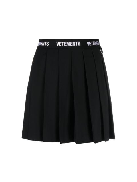 VETEMENTS logo-waistband pleated skirt