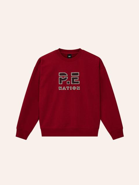 P.E NATION STRIKE SWEAT IN CHERRY