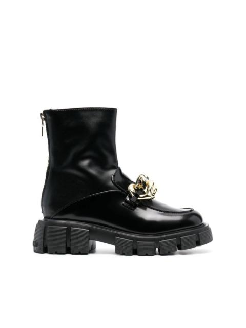 Moschino chain-embellished leather boots