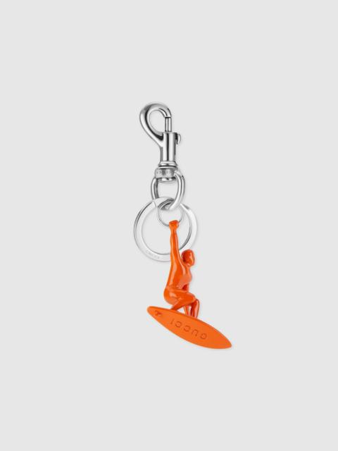 GUCCI Engraved surfer keychain charm