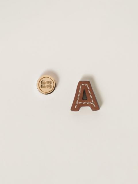 Miu Miu Leather and metal earrings