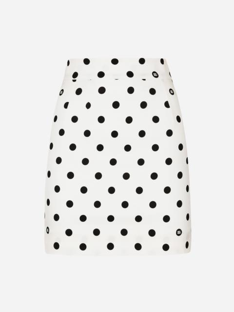 Short charmeuse skirt with polka-dot print