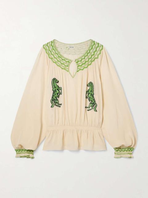 Rearing Stallions ruffled smocked embroidered crepe de chine blouse