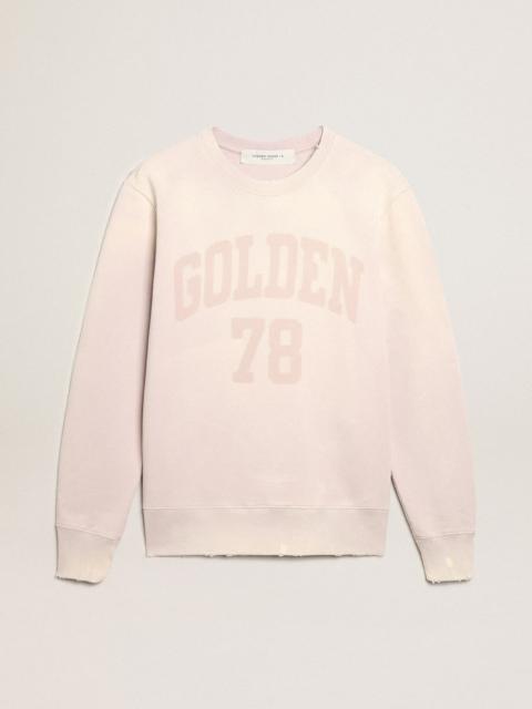 Distressed-finish pale pink sweatshirt
