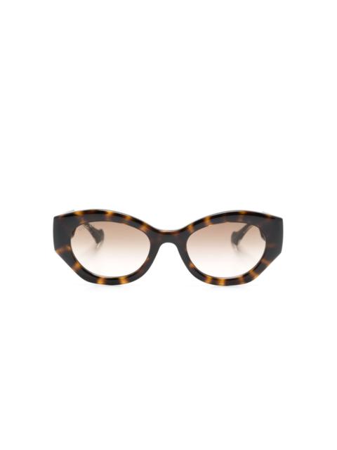 oval-frame sunglasses