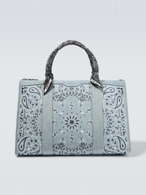 AMIRI Bandana-embroidered denim duffel bag