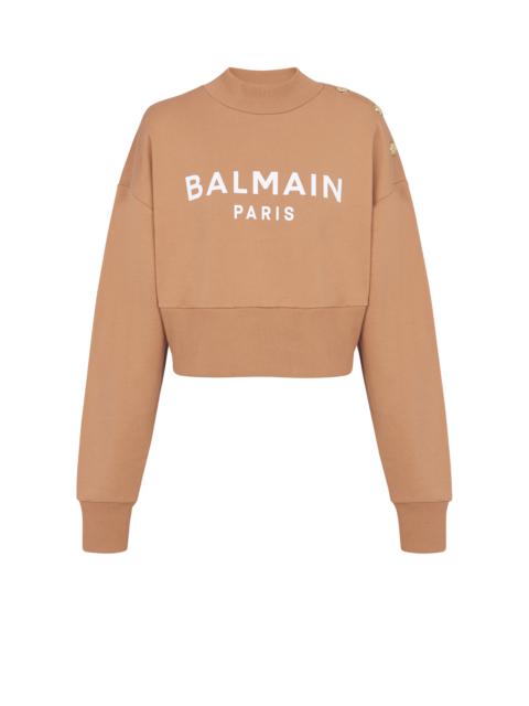 Cropped buttoned Balmain logo print sweatshirt