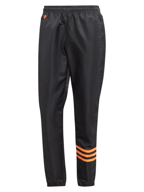 Neuclassics Track Pants in Black/Semi Impact Orange