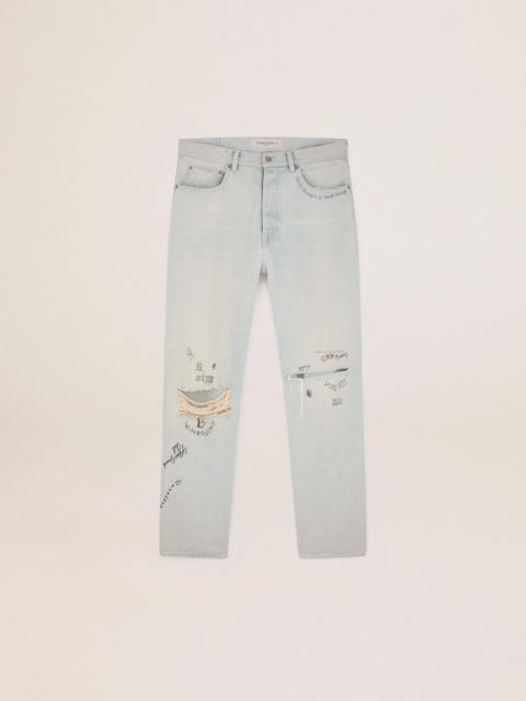 Men's bleached jeans with distressed treatment