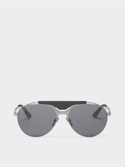 Ferrari Ferrari sunglasses in gunmetal grey metal and leather with blue lenses