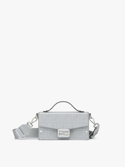 FENDI Baguette Soft Trunk bag made of light gray leather with a striped texture FF motif. Flap with magnet