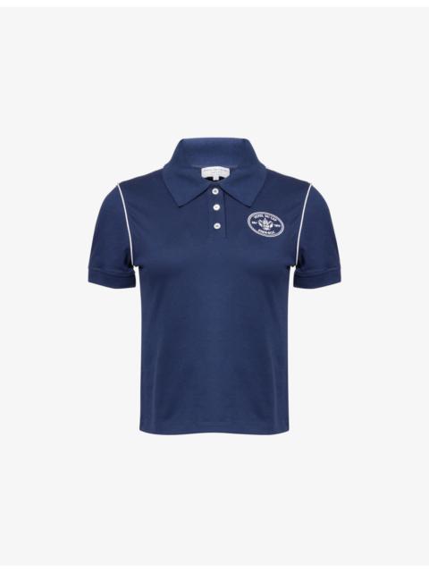 Sporty & Rich Eden Crest Cotton-Pique Polo Shirt