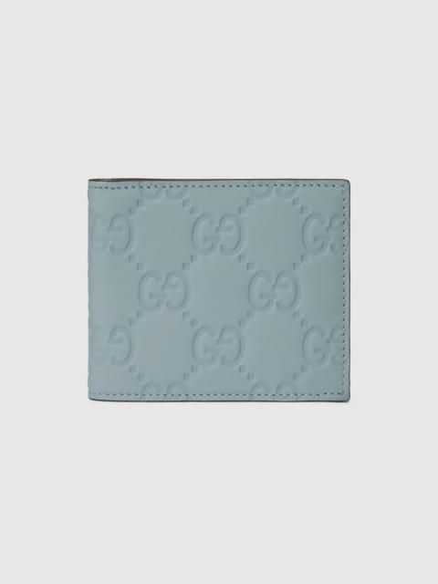 GUCCI GG rubber-effect bi-fold wallet