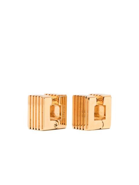 KHAITE small Empire engraved logo earrings