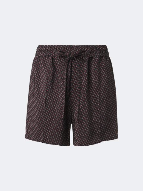 SAINT LAURENT Cassandre printed silk shorts