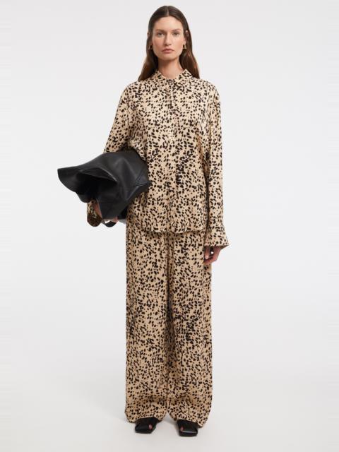AERON STALLION
Oversized print shirt