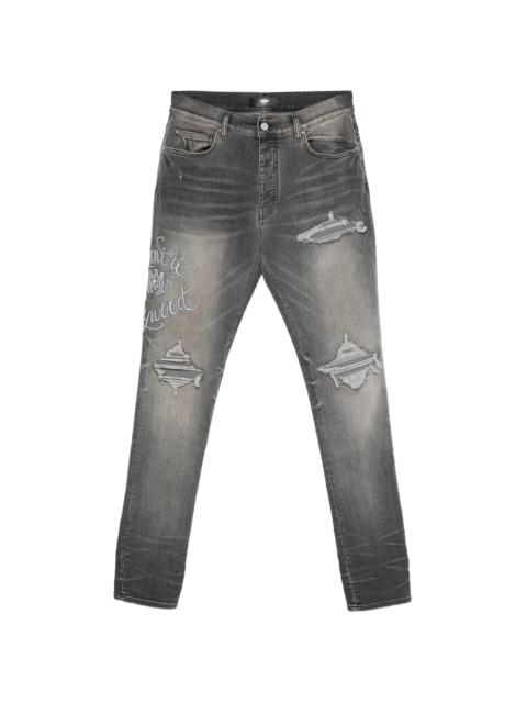 AMIRI Amiri Ripped Embroidery Jeans