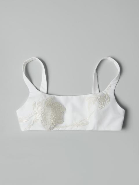 Lightweight wrinkled cotton poplin crop top with dazzling magnolia embroidery