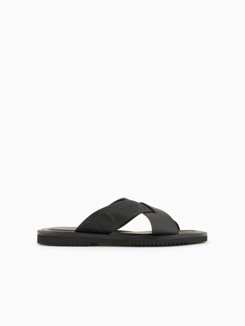 Leather cross-over sandals with logo tape