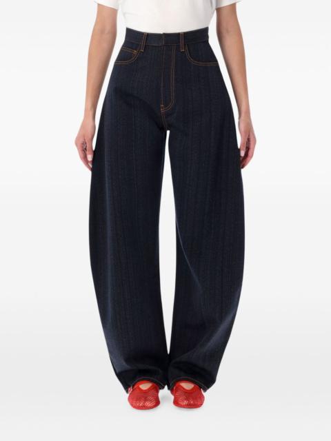 Alaïa contrast-stitch wide-leg jeans