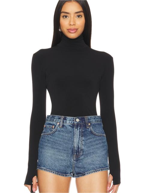 NORMA KAMALI Slim Fit Long Sleeve Turtleneck Top
