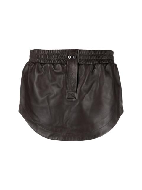 curved-hem leather miniskirt