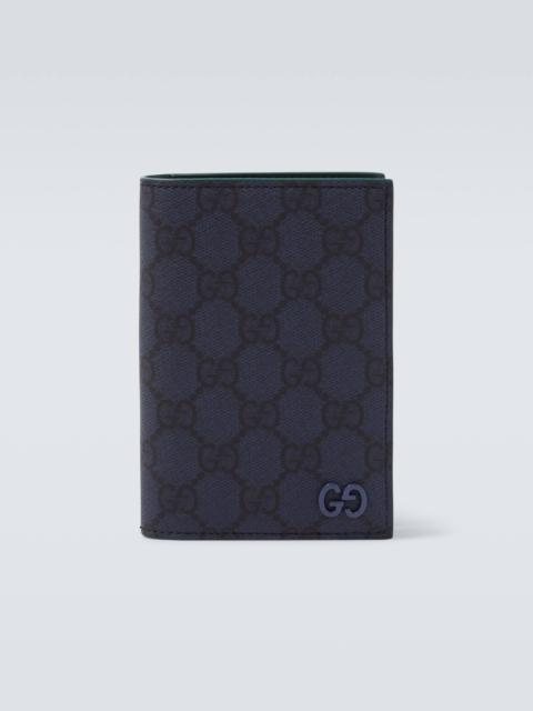 GUCCI GG Supreme leather-trimmed canvas wallet