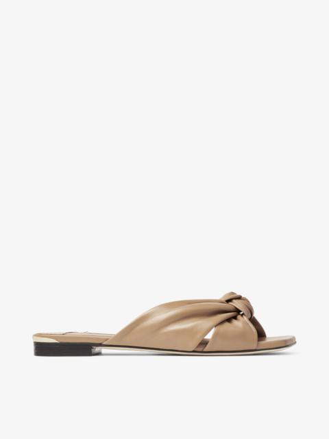 JIMMY CHOO Avenue Flat
Biscuit Nappa Leather Flat Sandals