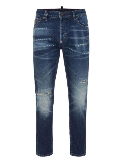 PHILIPP PLEIN distressed logo-plaque jeans