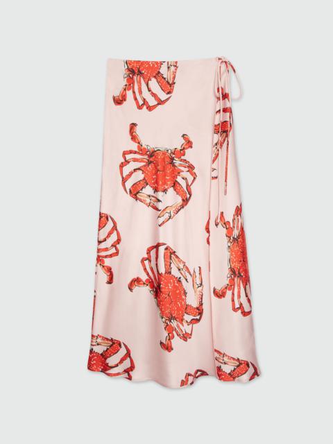 MSGM Fluid midi skirt in pink satin with "King grab" print