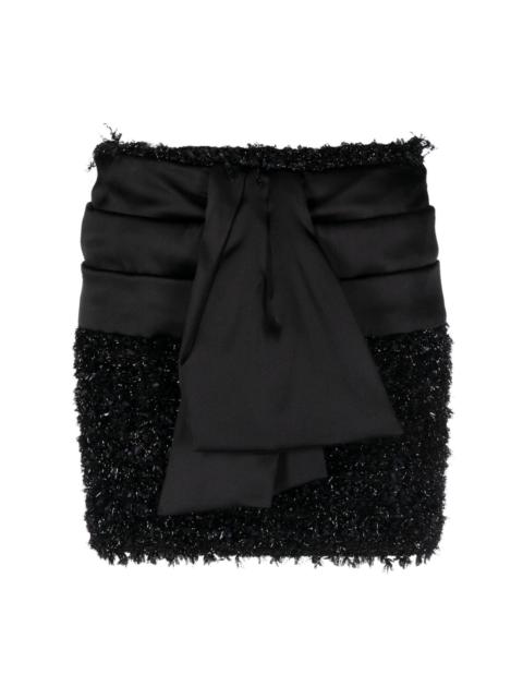 bow-embellished tweed skirt