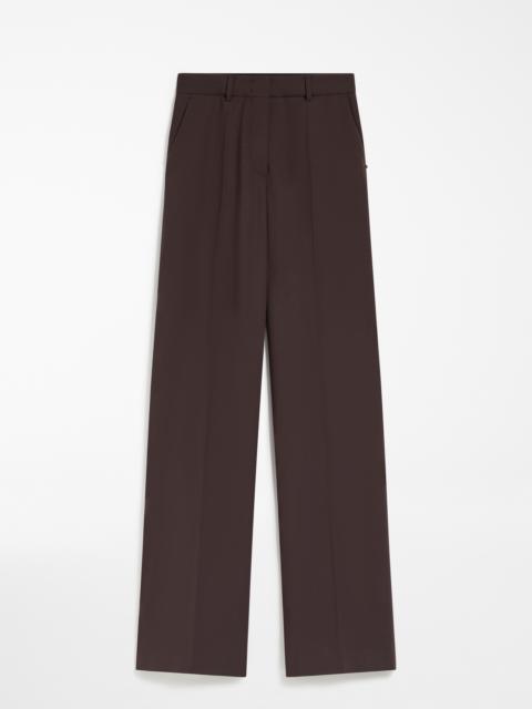 OXALIS Flared stretch wool trousers