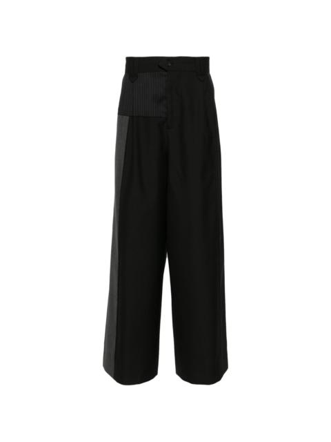 deconstructed wide-leg trousers
