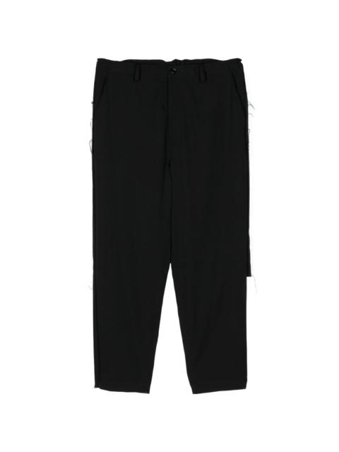 raw-cut tapered trousers