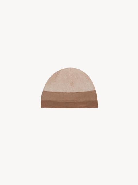 SAINT LAURENT HAT, HEADBAND, AND CHOKER IN VISCREPE